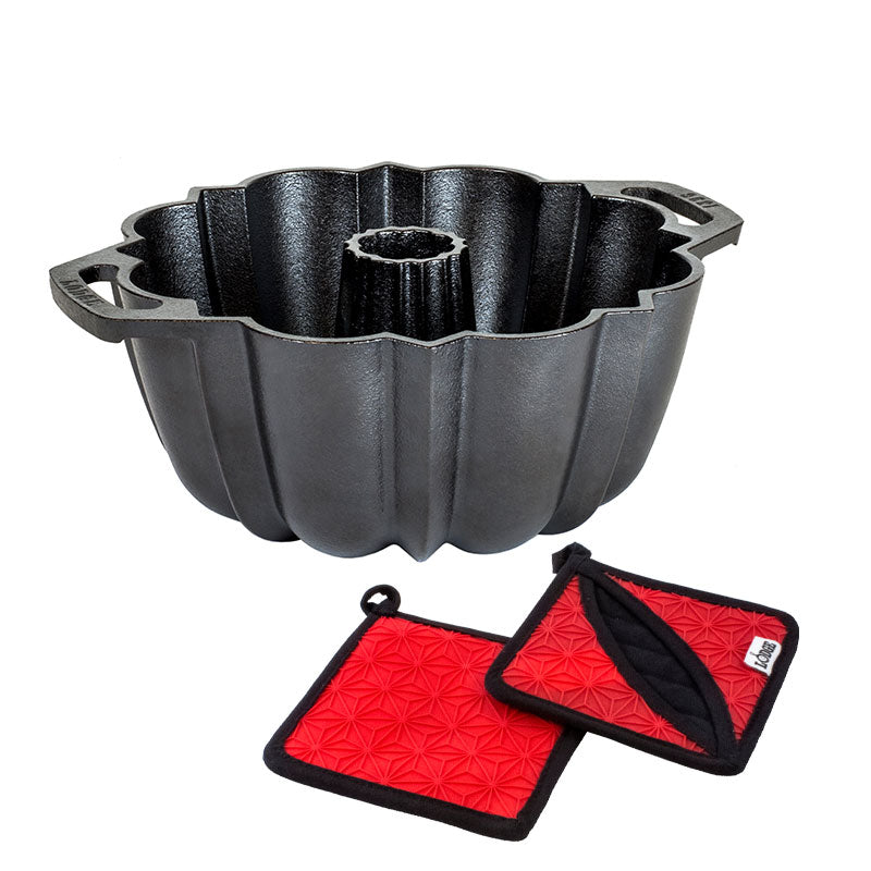 Cast Iron Fluted Cake Pan with Red Potholders - Lodge
